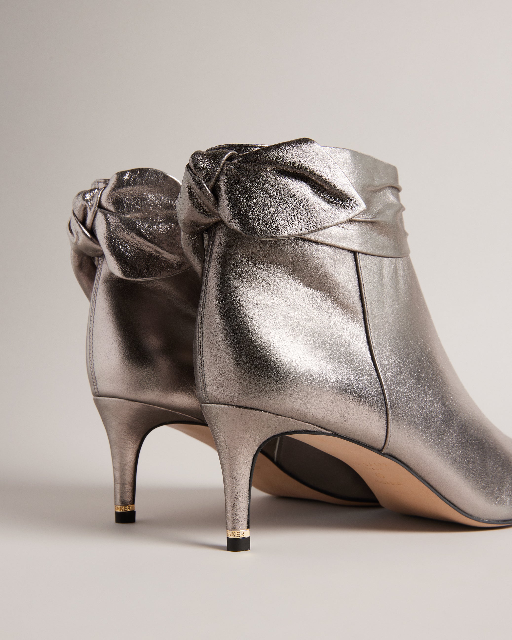 Buy Yona Suede Bow Detail Ankle Boots Gunmetal Ted Baker KSA