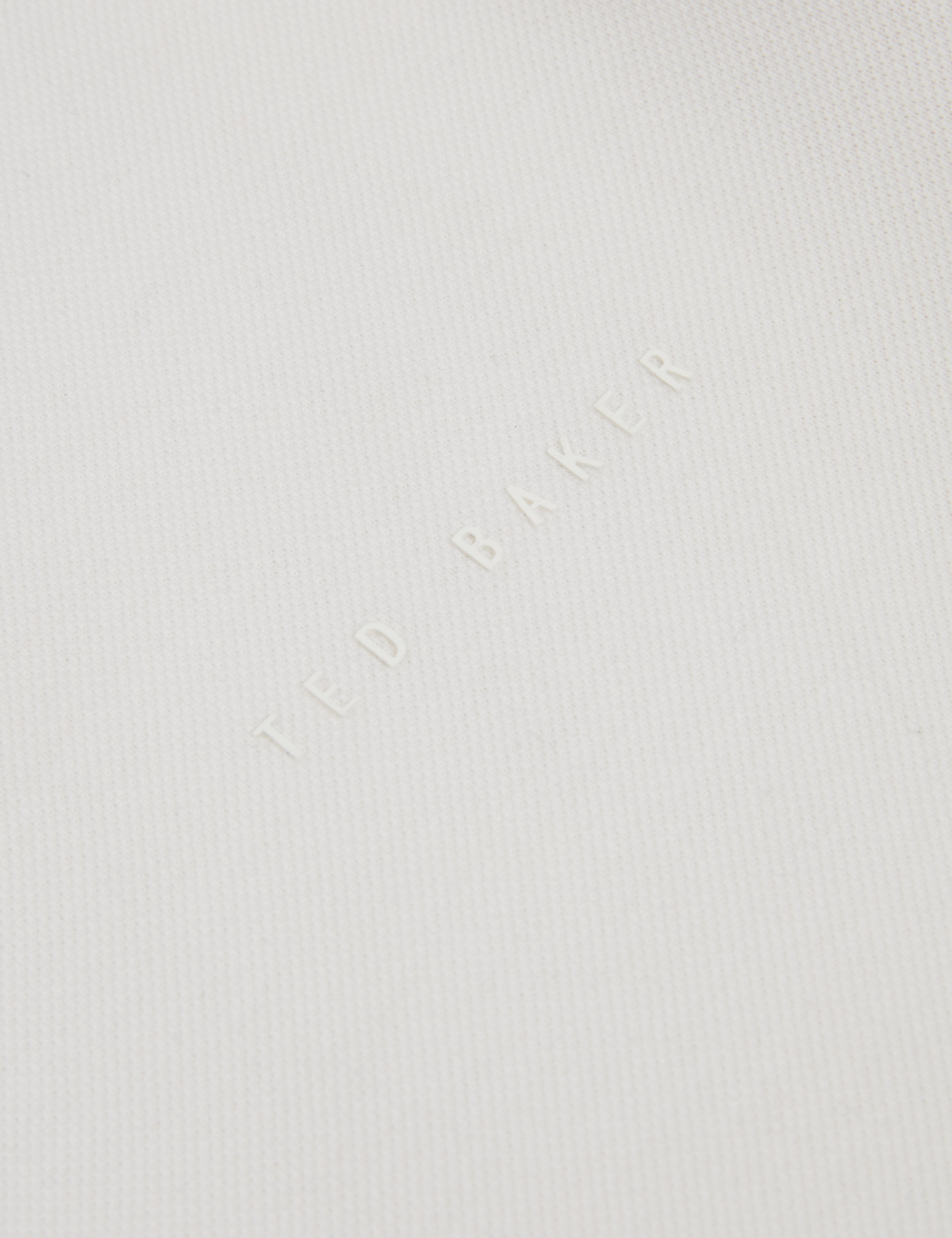 سيريل قميص بولو باللون الأبيض