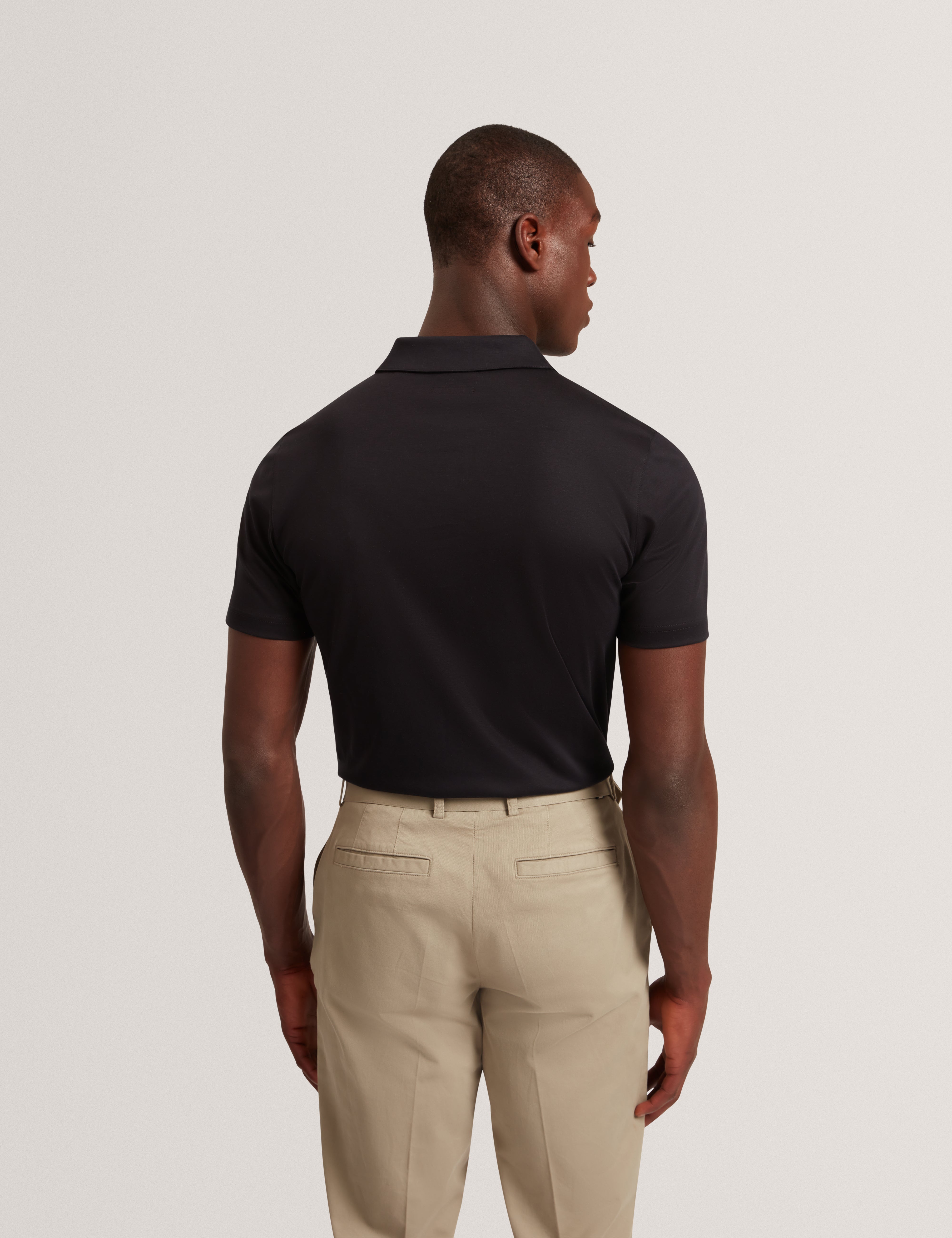 كونال قميص بولو أسود بقماش ناعم