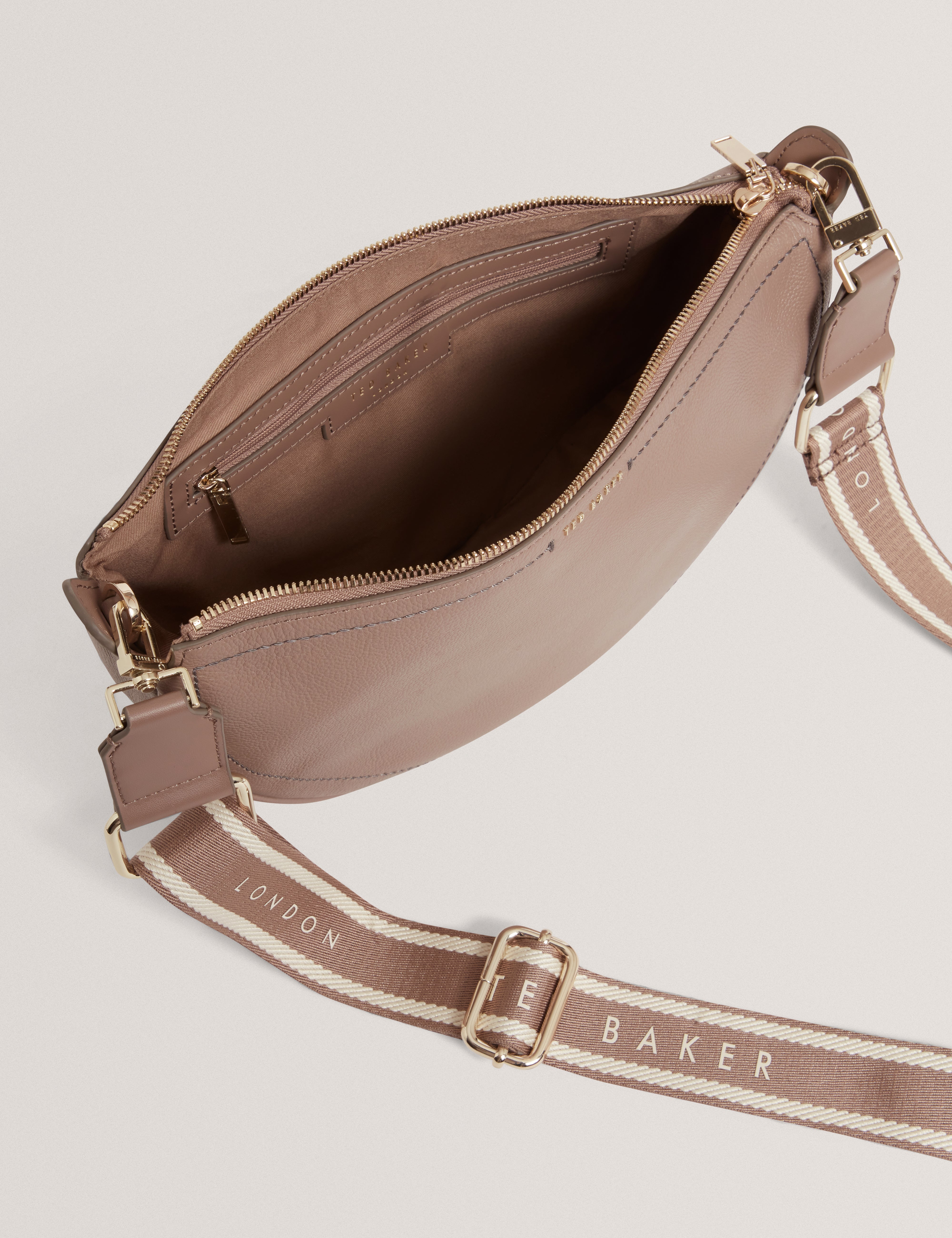 Lorreen Webbing Leather Half Moon Crossbody Bag Taupe