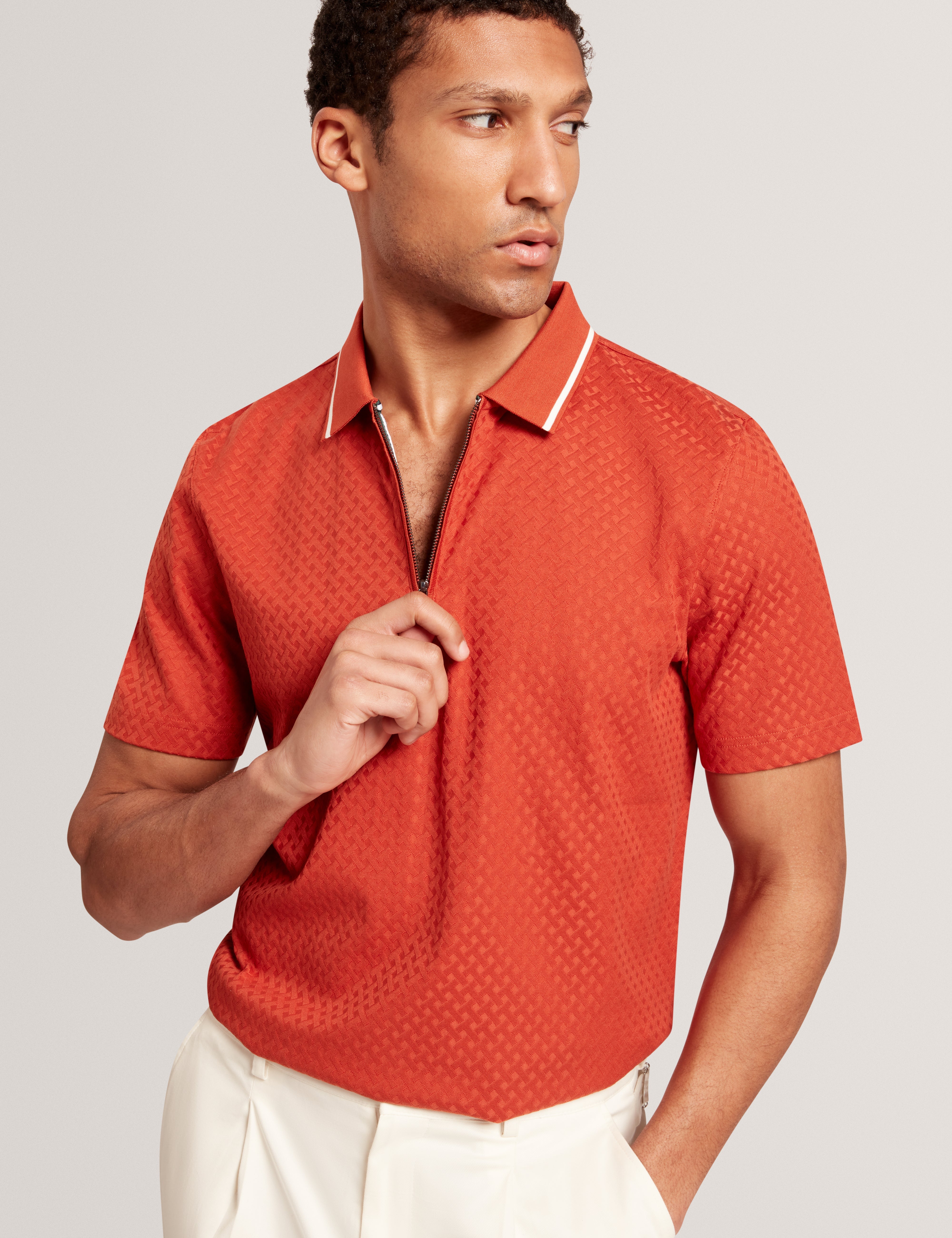 كوفين قميص بولو بأكمام قصيرة لون برتقالي داكن