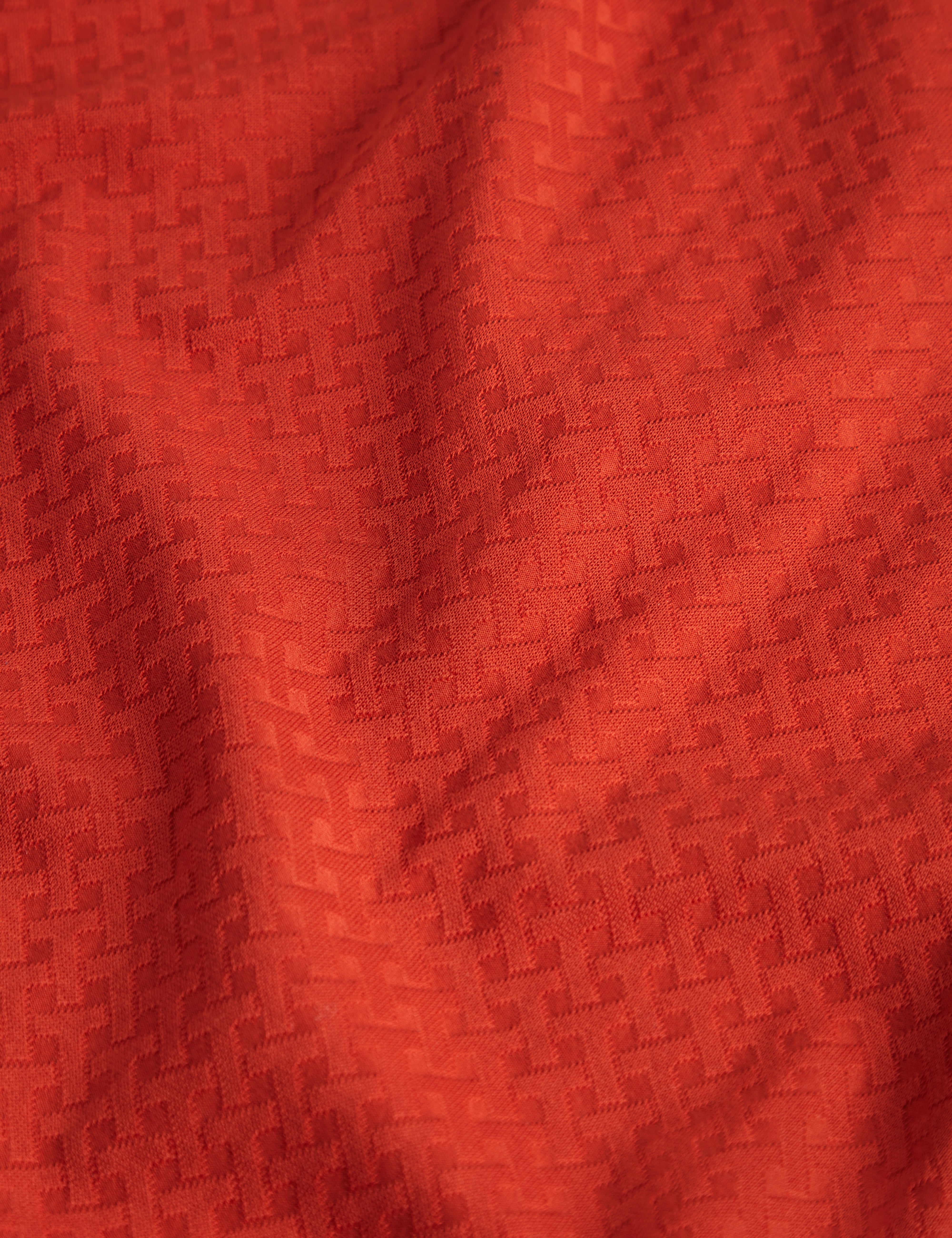 كوفين قميص بولو بأكمام قصيرة لون برتقالي داكن