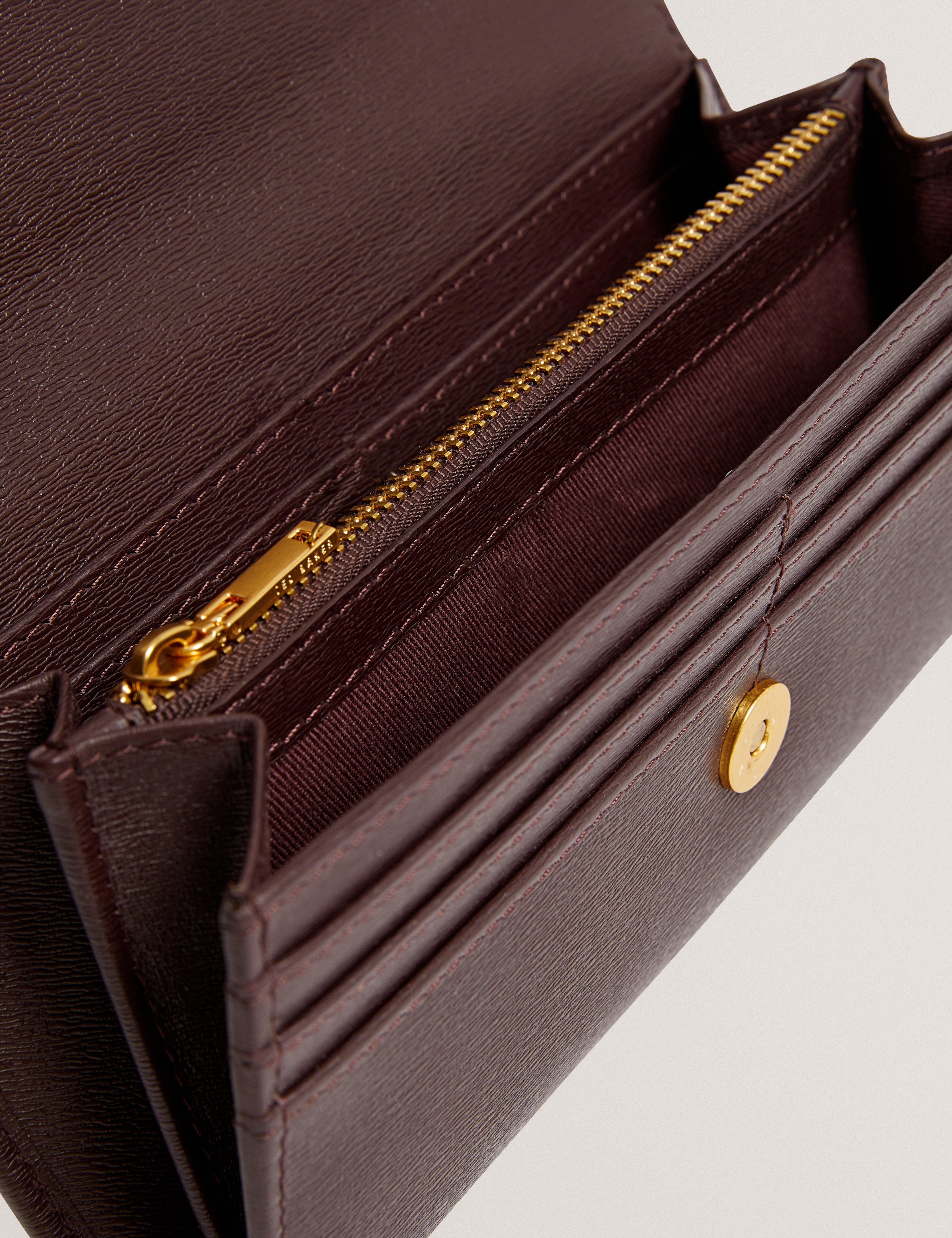 أنيسال محفظة جلدية كبيرة باللون الأحمر الداكن