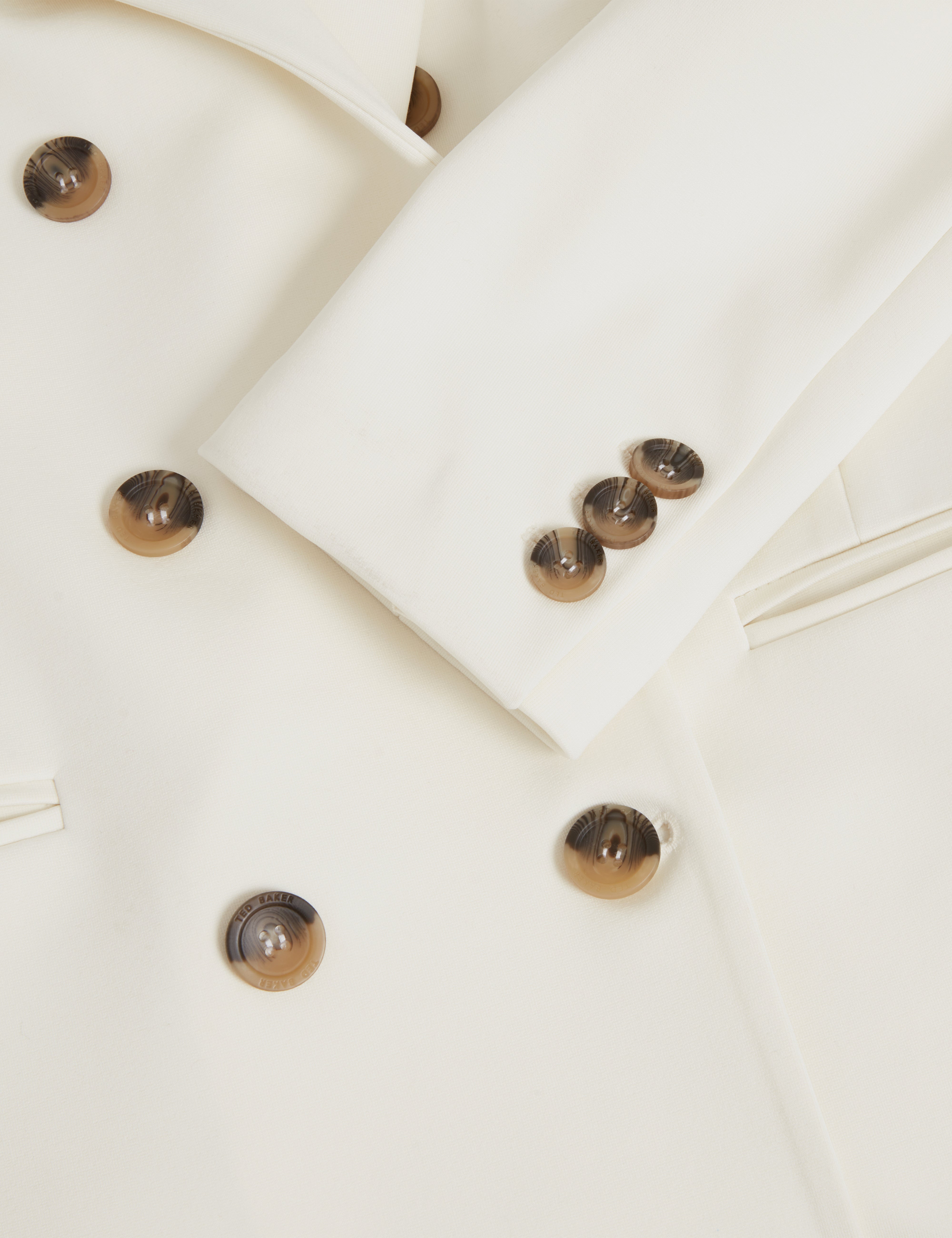 باولين بليزر بصدر مزدوج لون عاجي