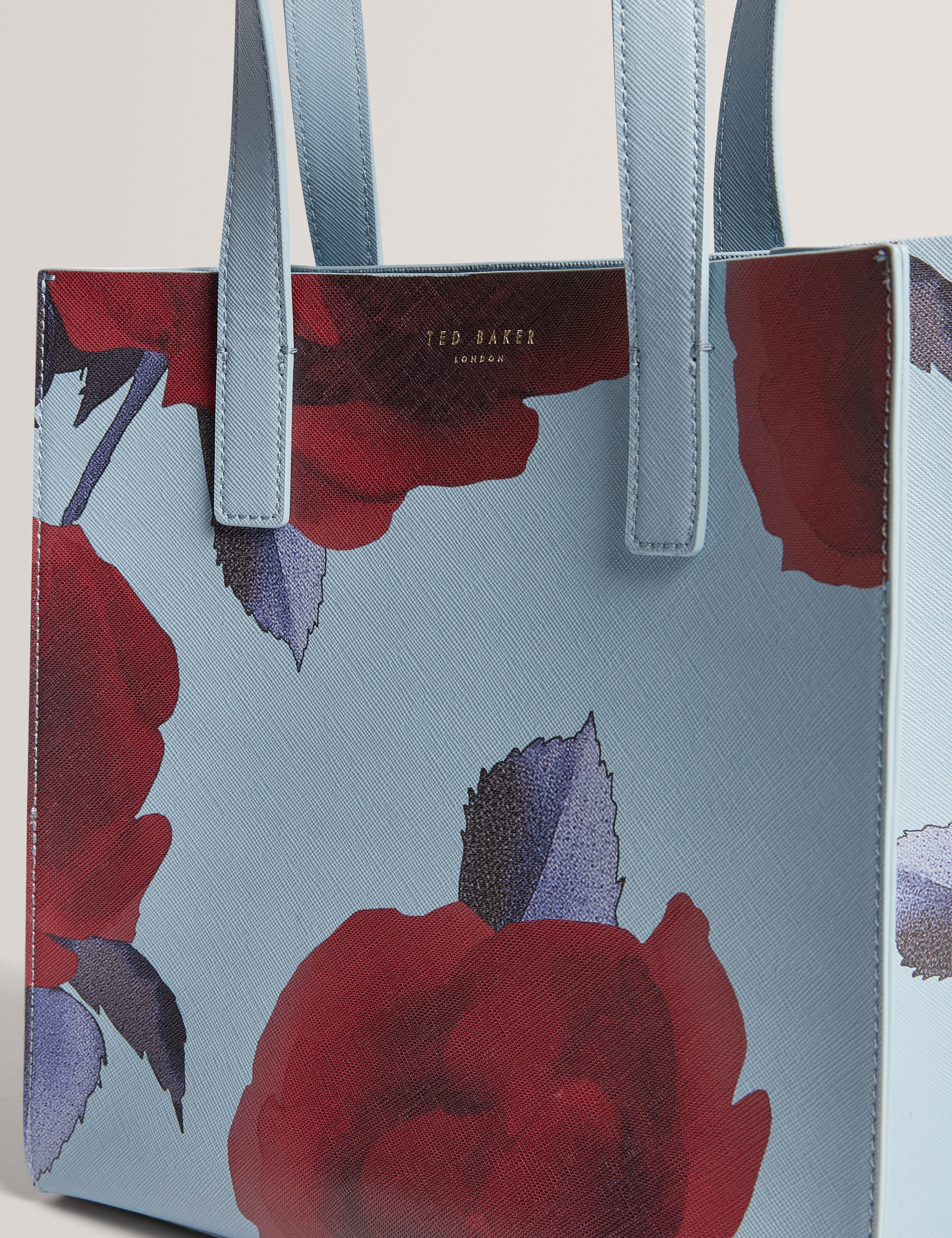 إيميري حقيبة صغيرة فلورال لون أزرق متوسط