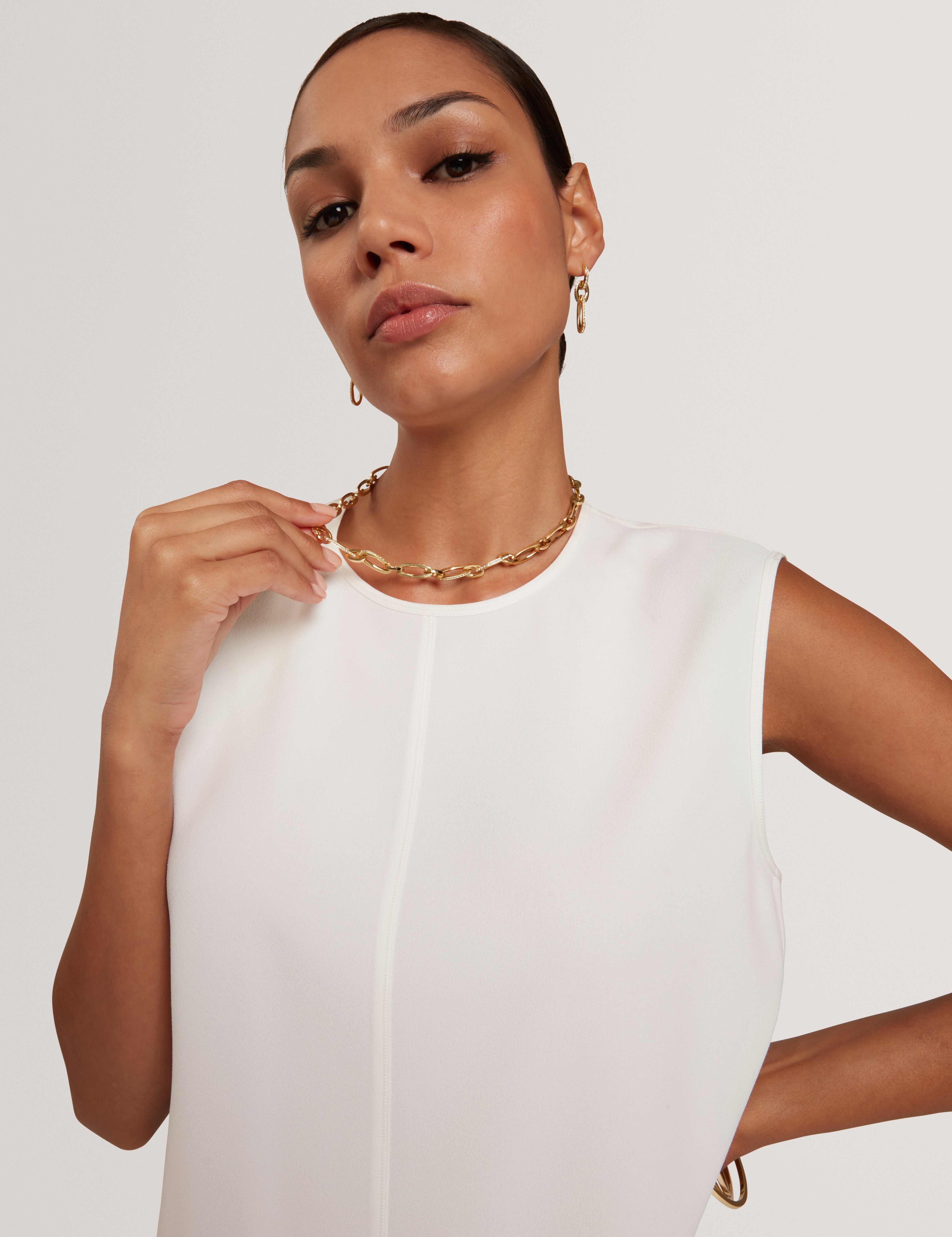 بلوزة مارميا بدون أكمام مع تفاصيل حواف باللون العاجي