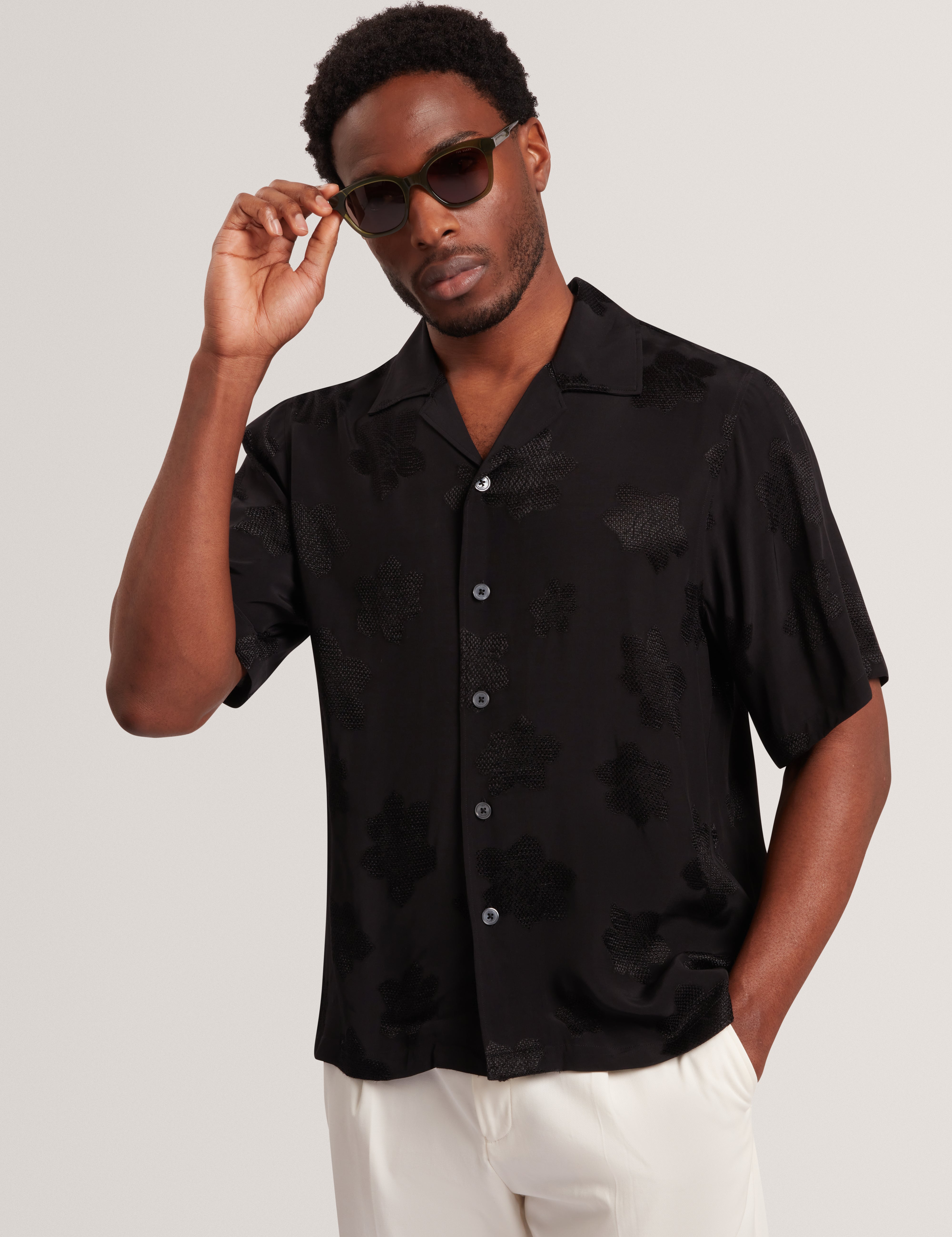 Thovan Short Sleeve Relaxed Mesh Cut Out Top Black