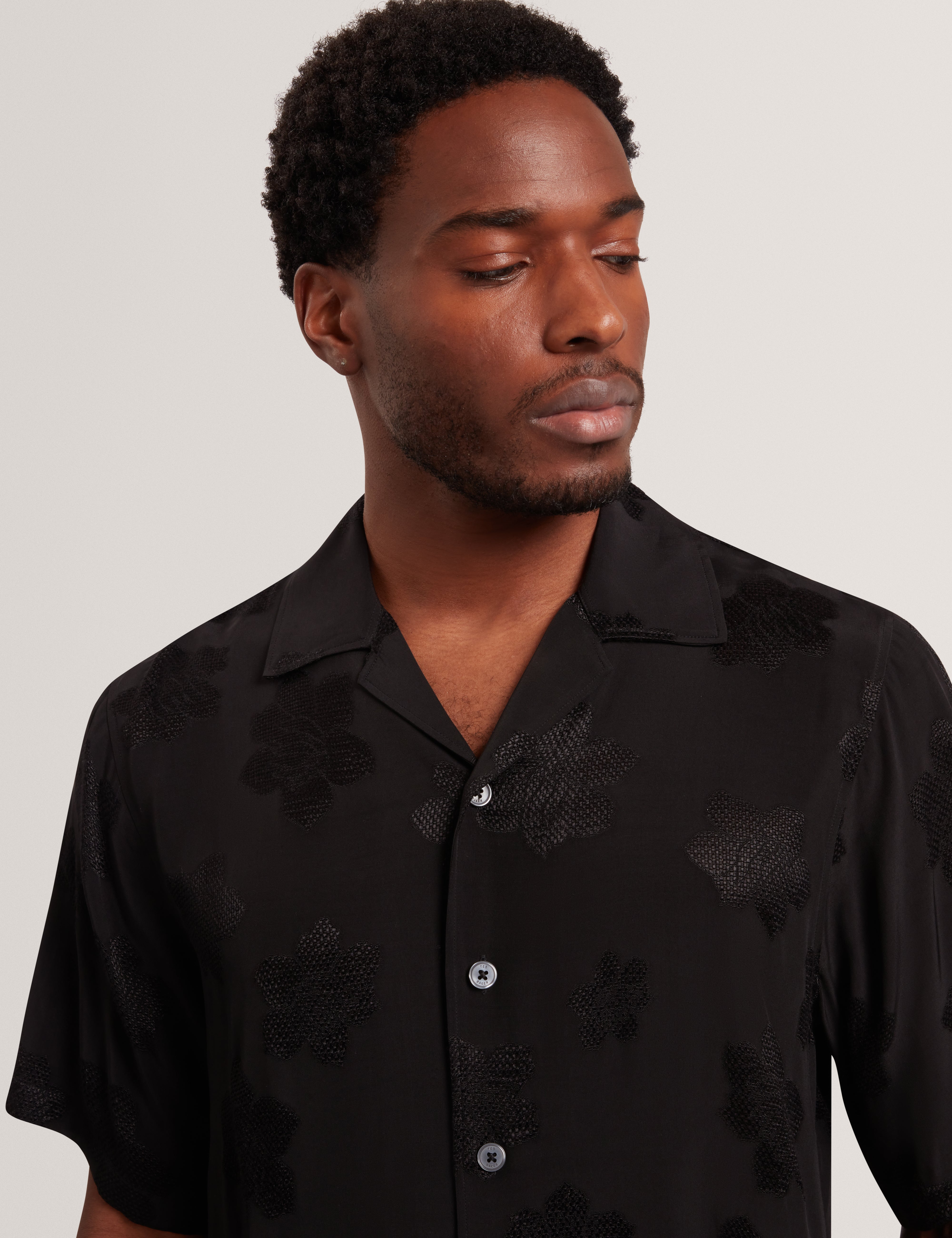Thovan Short Sleeve Relaxed Mesh Cut Out Top Black