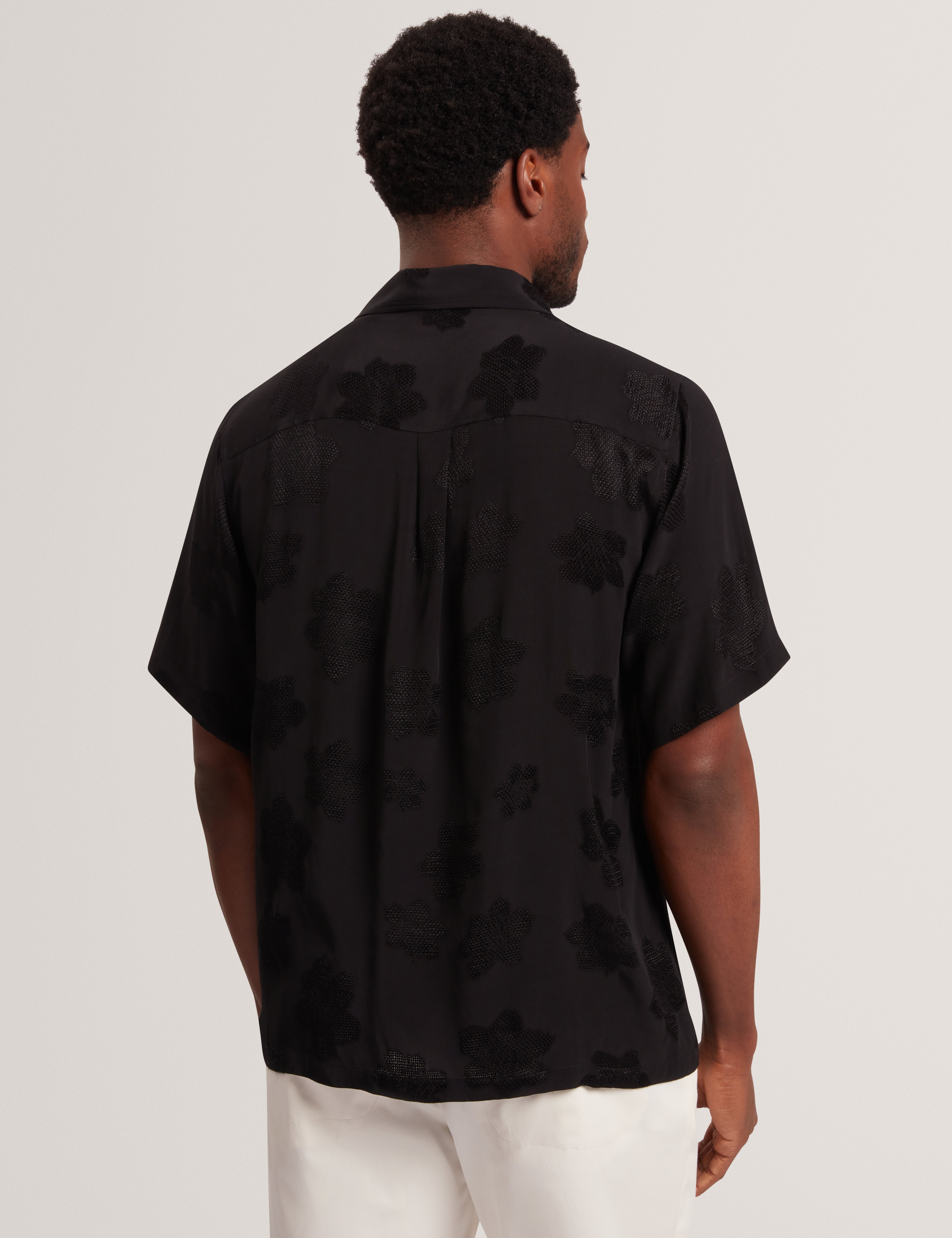 Thovan Short Sleeve Relaxed Mesh Cut Out Top Black