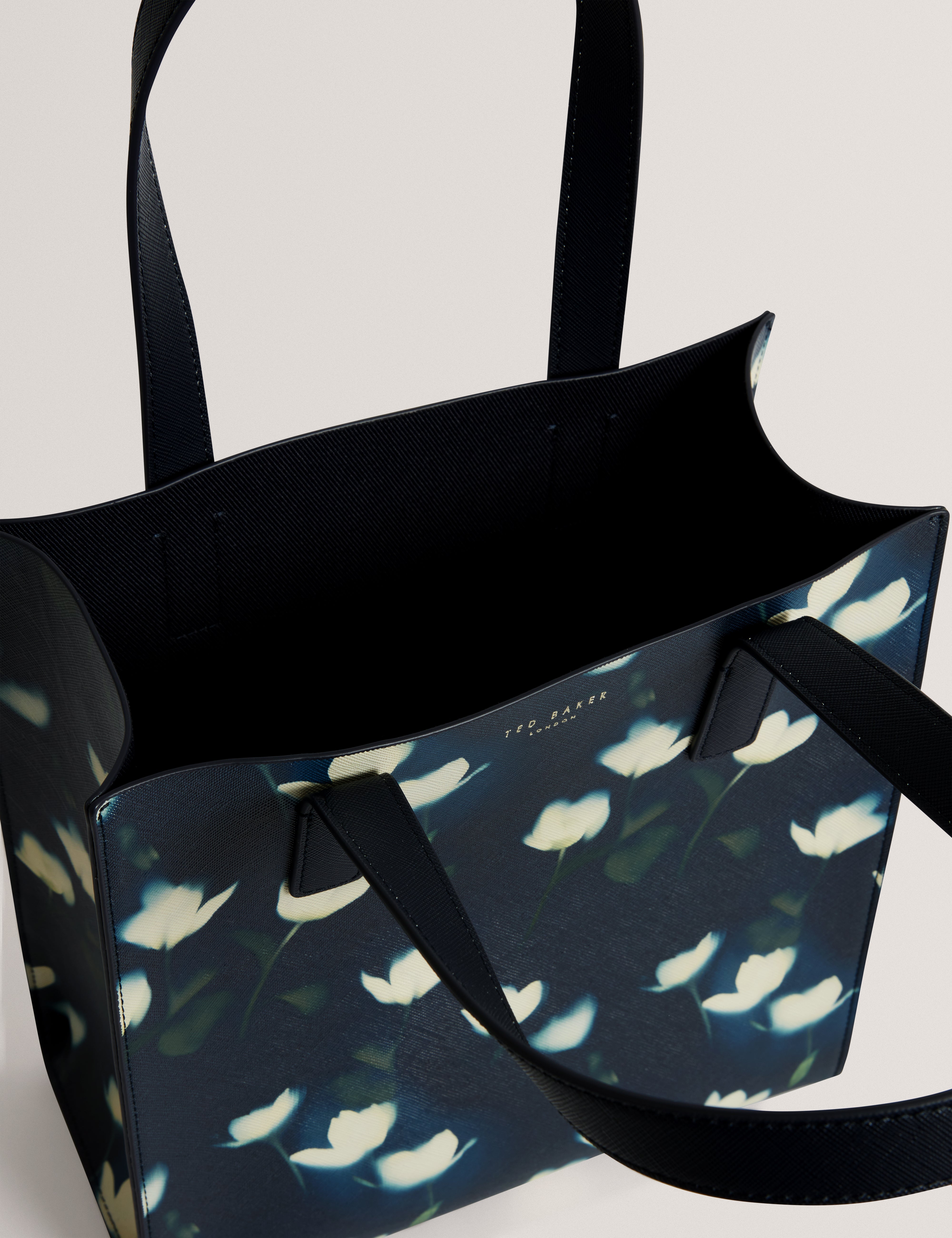 حقيبة توتوكون الصغيرة المطبوعة بنقشة توليب باللون الأزرق البحري