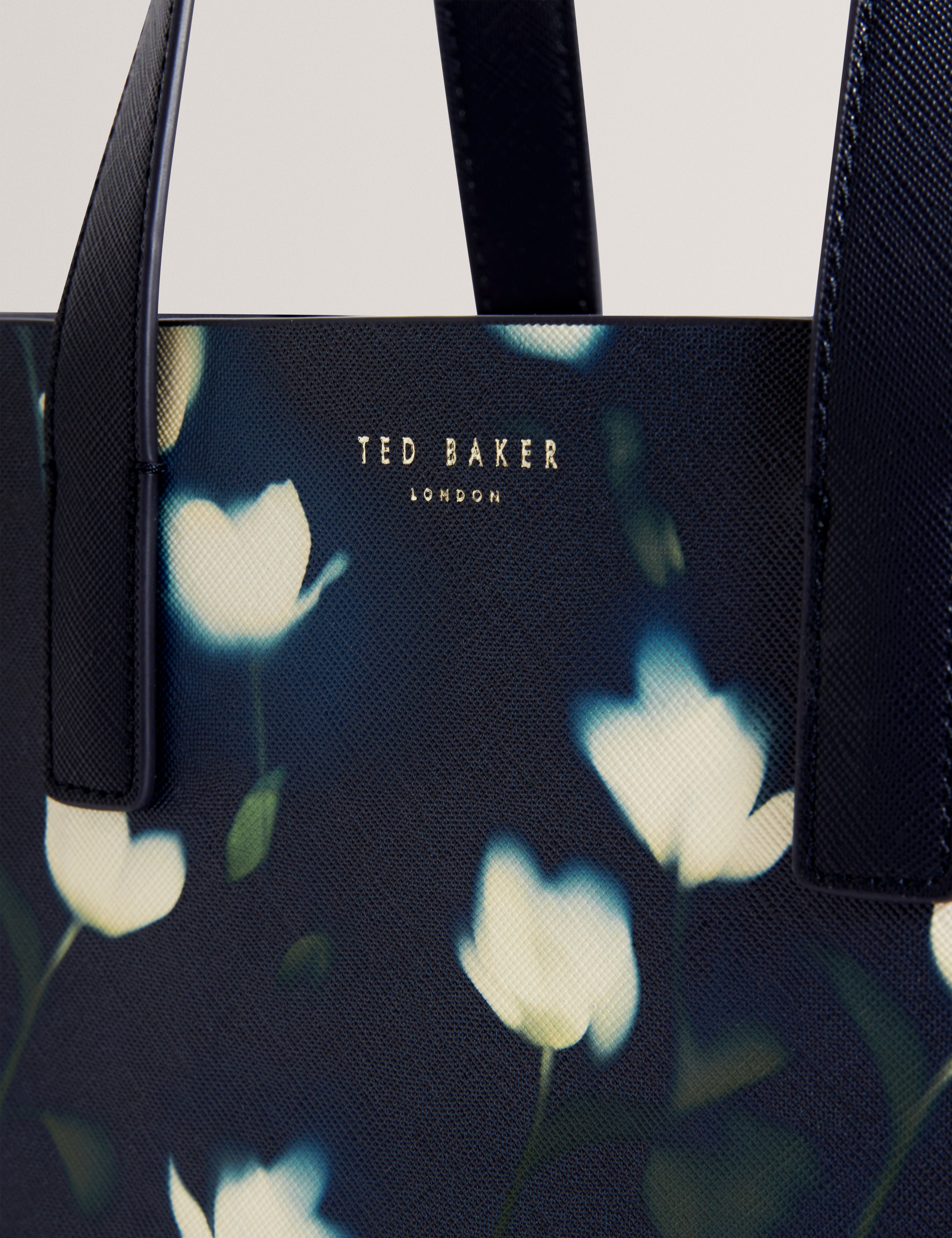 حقيبة توتوكون الصغيرة المطبوعة بنقشة توليب باللون الأزرق البحري