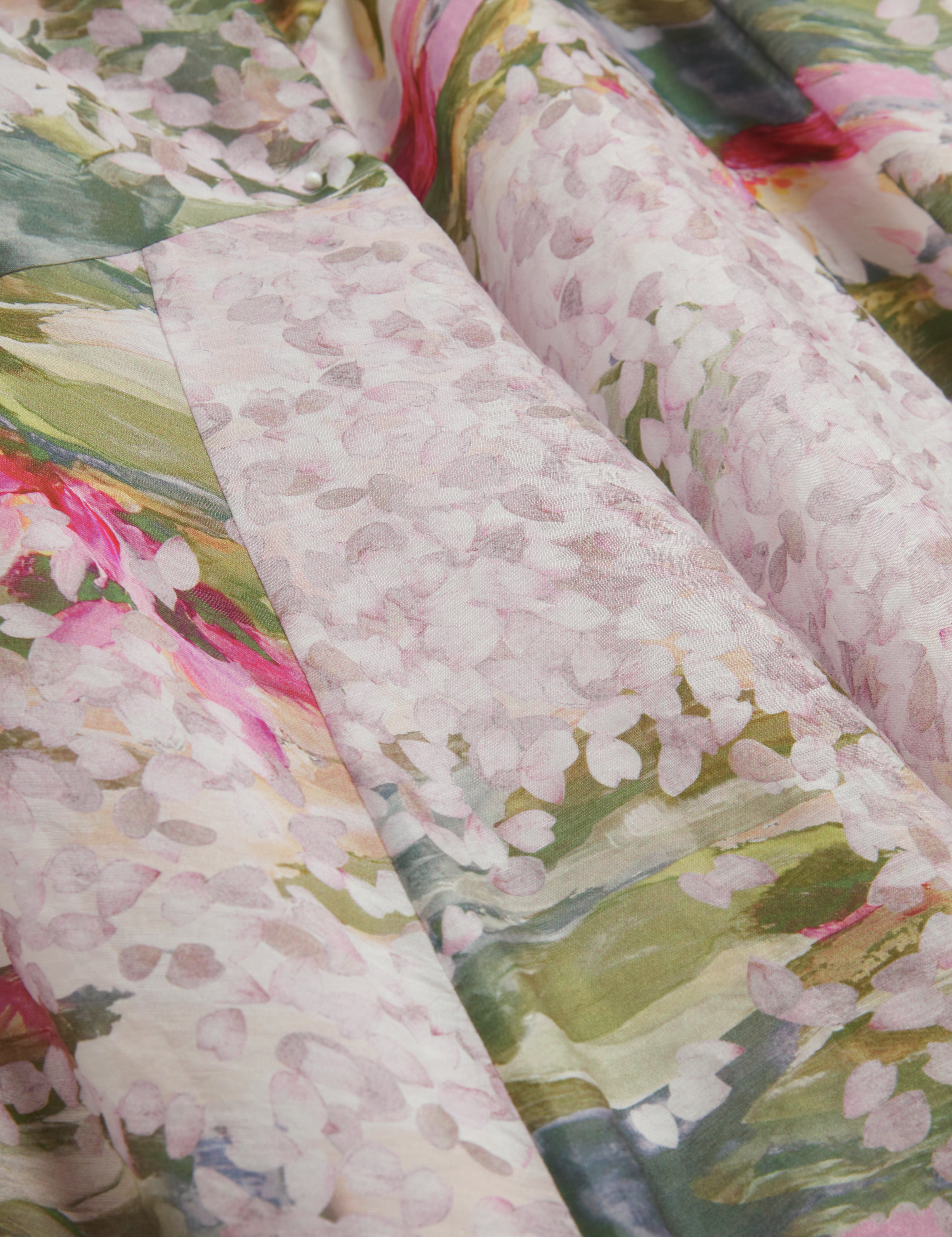 تنورة ميدي مطبوعة من لايدا بتفاصيل خياطة مائلة، لون وردي